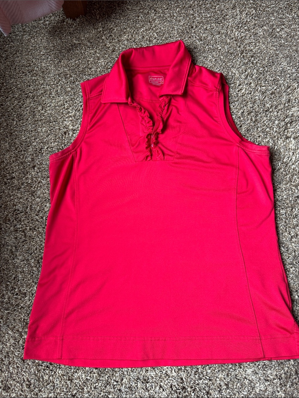 Aspire Sleeveless Ruffle Polo in Hot Pink
